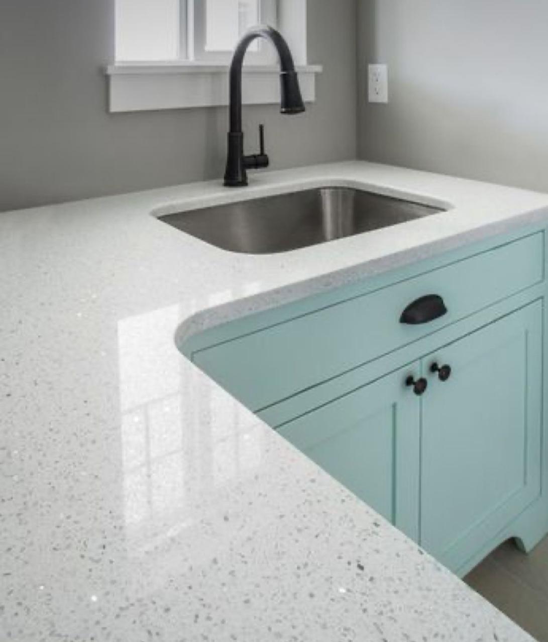 White Galaxy quartz fitted as a kitchen countertop, Chennai Quartz Chennai